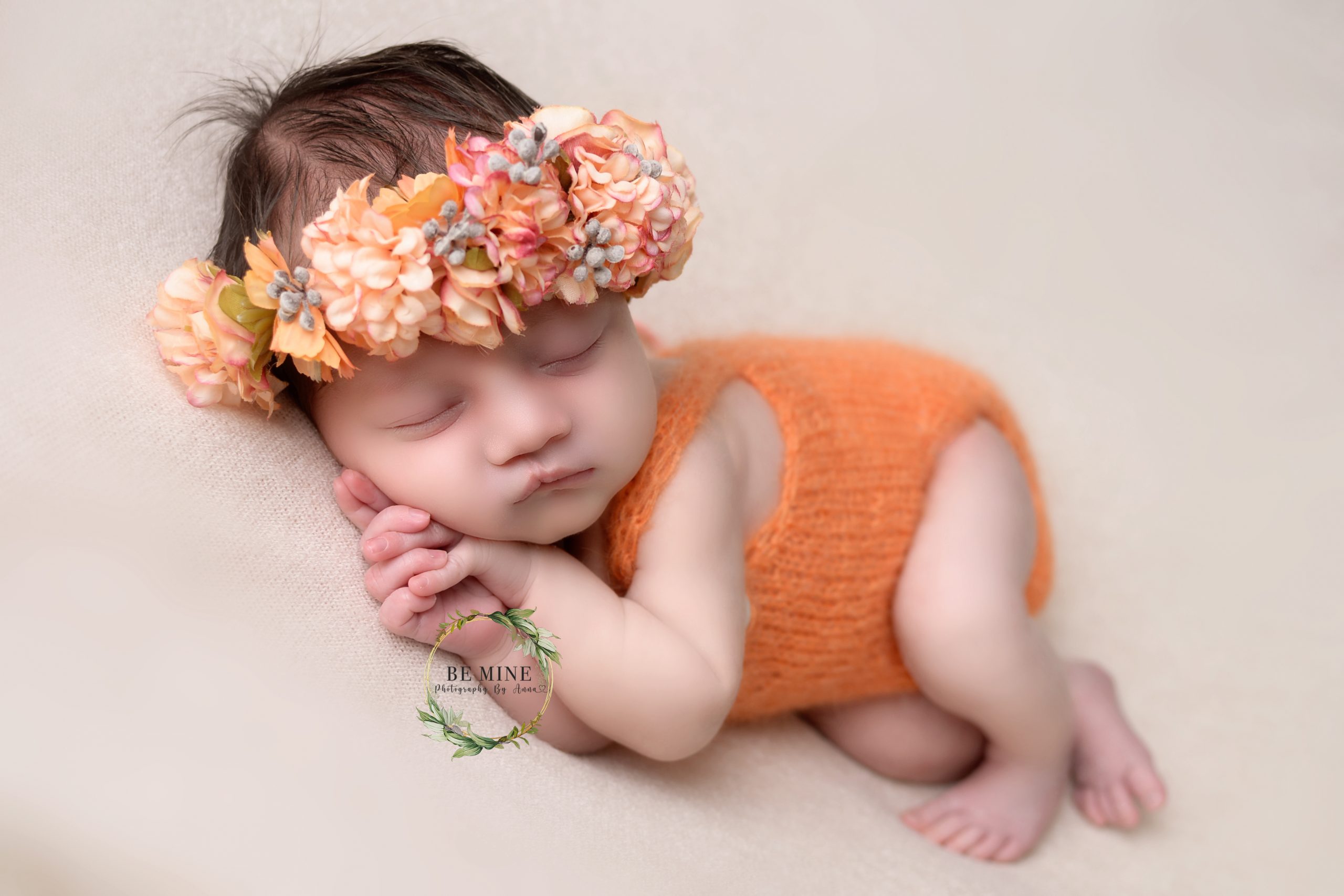 Sleeping baby with flower headband